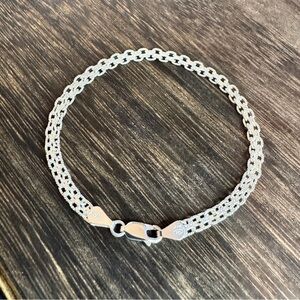 Milor Sterling Silver 3D Textured Infinity Link Bracelet